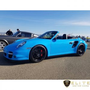 Porsche wrapped in Avery SW Gloss Light Blue vinyl