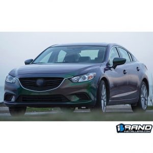 Mazda wrapped in new Avery ColorFlow Gloss Urban Jungle Silver/Green shade shifting vinyl
