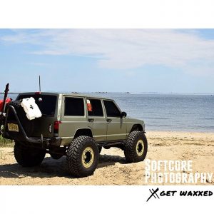 Jeep wrapped in Avery SW Matte Midnight Sand Metallic vinyl