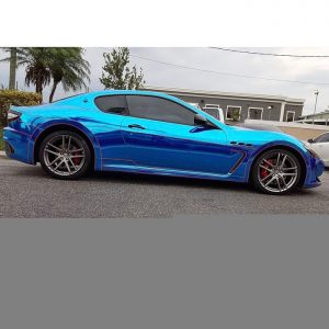 Maserati wrapped in Avery Blue Chrome and 1200 Orange Reflective vinyls