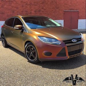 Ford wrapped in ColorFlip Satin Volcanic Flare Red/Gold shade shifting vinyl