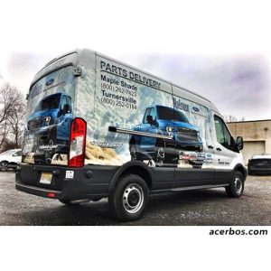 Ford wrapped in custom printed Avery 1105EZRS vinyl by