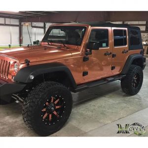 Jeep Wrangler wrapped in Arlon 2600CX Copper Chrome vinyl