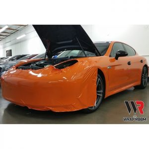 Porsche wrapped in Avery SW Gloss Orange vinyl