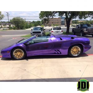 Lamborghini wrapped in Avery Silver Chrome overlaminated with SF 100 Transparent Purple vinyl