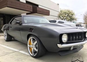 Chevrolet Camaro wrapped in Avery SW Satin Black vinyl