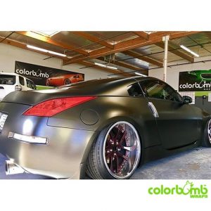 Nissan wrapped in Satin Gold Dust Black vinyl