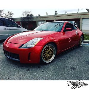 Nissan wrapped in Gloss Dragon Fire Red vinyl