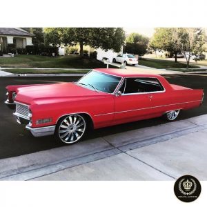 Cadillac wrapped in Avery SW Matte Cherry Metallic Vinyl