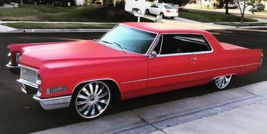 Cadillac wrapped in Avery SW Matte Cherry Metallic Vinyl