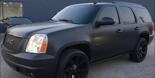 GMC wrapped in 1080 Matte Black vinyl