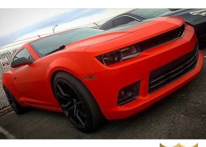 Chevrolet Camaro wrapped in Matte Red vinyl