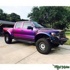 Ford Raptor wrapped in Avery ColorFlow Gloss Rushing Riptide Cyan/Purple shade shifting vinyl