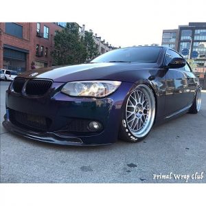 BMW 335i wrapped in Gloss Deep Space Blue/Bronze/Purple vinyl