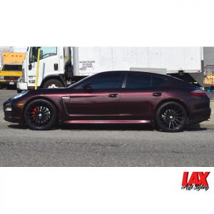 Porsche wrapped in Gloss Black Rose vinyl