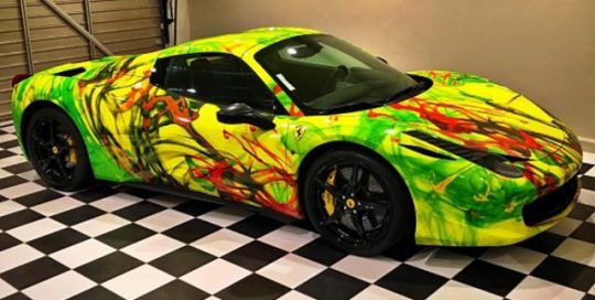 Ferrari wrapped in custom printed 3M 1080 Satin Fluorescent Neon yellow vinyl