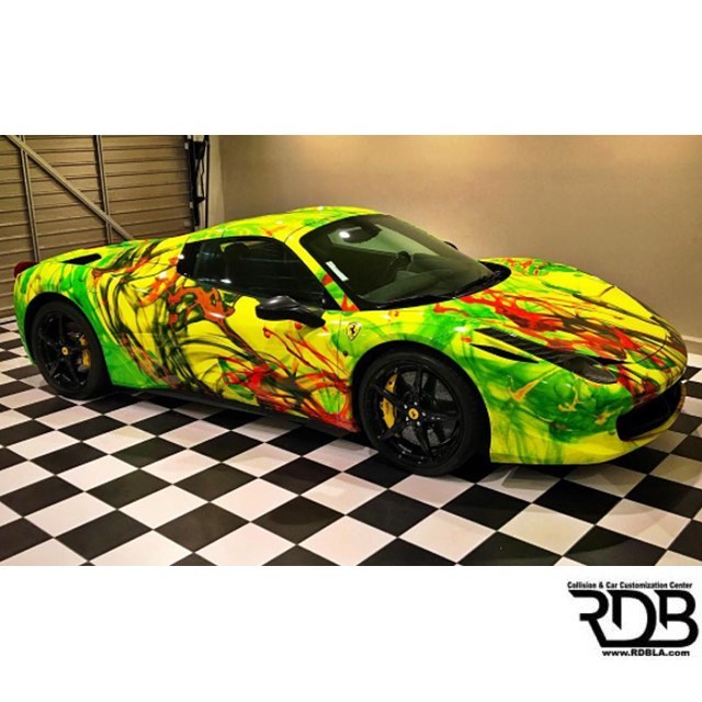 Ferrari wrapped in custom printed 3M 1080 Satin Fluorescent Neon yellow  vinyl