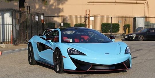McLaren wrapped in 3M 1080 Gloss Sky Blue vinyl