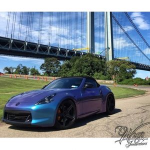 Nissan wrapped in Orafol Shift Effect Turquoise/Lavender shade shifting vinyl