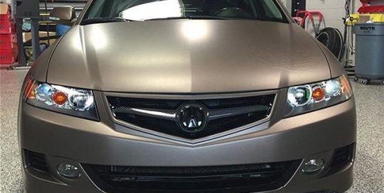 Acura wrapped in Matte Brown Metallic vinyl