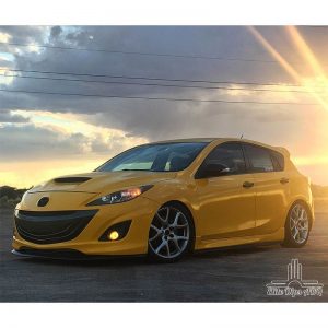 Mazda wrapped in 3M 1080 Sunflower Yellow vinyl