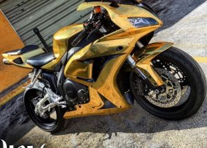 Honda wrapped in Avery SW Gold Chrome vinyl