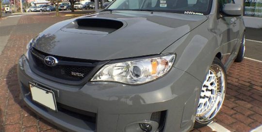 Subaru wrapped in Avery SW Gloss Dark Grey vinyl