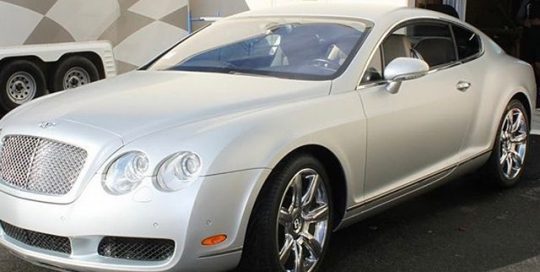 Bentley wrapped in Satin White Aluminum vinyl