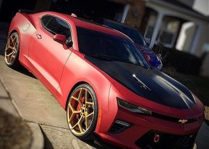 Chevrolet Camaro wrapped in Matte Red Metallic and Satin Black vinyls