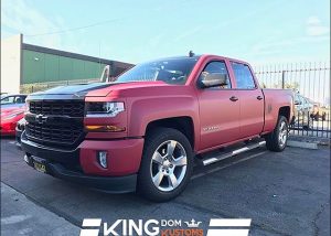 Chevrolet wrapped in Matte Red Metallic and Gloss Black Metallic vinyls