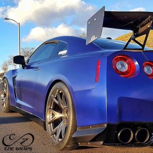 Nissan wrapped in Satin Mystique Blue vinyl