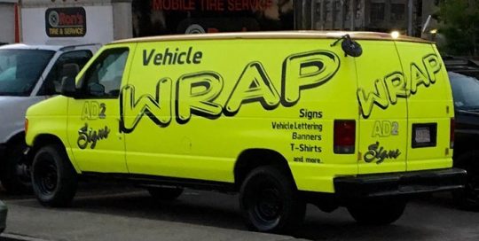 Chevrolet van wrapped in 1080 Fluorescent Neon Yellow and Black vinyls