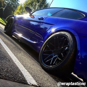 BMW wrapped in Gloss Blue Raspberry vinyl