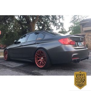BMW wrapped in Avery SW Satin Pearl Nero vinyl