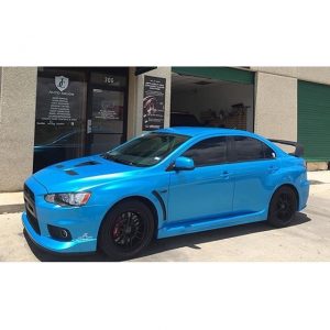 Mitsubishi wrapped in Avery SW Bahama Blue Pearl vinyl
