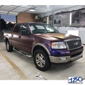 Ford wrapped in ColorFlow Satin Roaring Thunder Blue/Red shade shifting vinyl