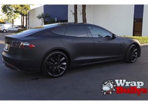 Tesla wrapped in Matte Deep Black vinyl
