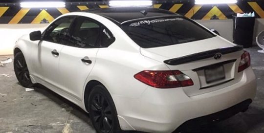Infiniti wrapped in 3M 1080 Satin White vinyl
