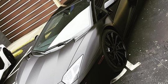 Lamborghini wrapped in Avery SW Satin Black vinyl