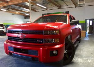 Chevrolet wrapped in 3M 1080 Satin Smoldering Red vinyl