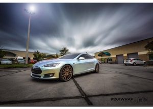 Tesla wrapped in Orafol 970RA Shift Effect Pearl/Green vinyl