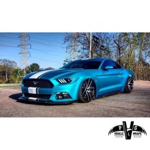 Ford wrapped in Gloss Atomic Teal vinyl