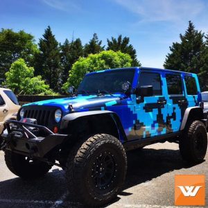 Jeep wrapped in custom printed digitalcamo on Avery MPI 1005 vinyl and DOL Sparkle overlam vinyl