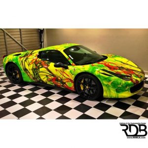 Ferrari wrapped in custom printed 3M 1080 Satin Fluorescent Neon yellow vinyl