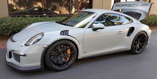 Porsche wrapped in 3M 1080 Satin Battleship Gray vinyl