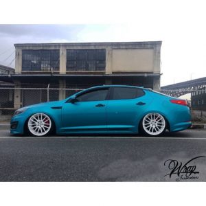 Kia wrapped in 1080 Gloss Atomic Teal vinyl