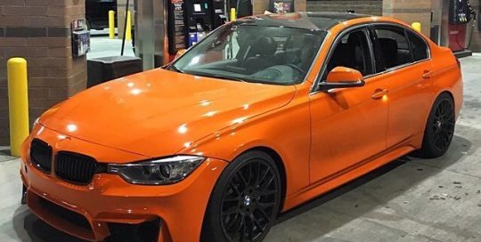 BMW wrapped in Avery SW Gloss Orange vinyl