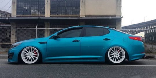 KIA wrapped in 3M 1080-G356 Gloss Atomic Teal