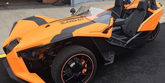 Polaris Slingshot wrapped in 3M 1080-M54 Matte Orange