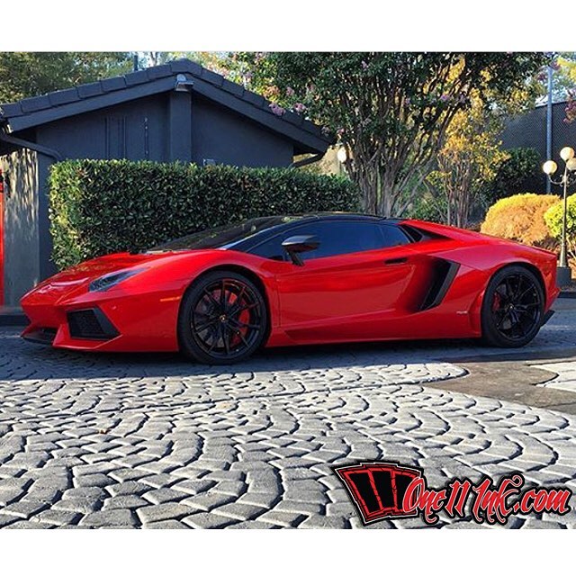 Lamborghini wrapped in Avery SW900-436 Gloss Carmine Red - Vinyl